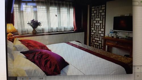 Лицзян: Lijiang Xianshe House