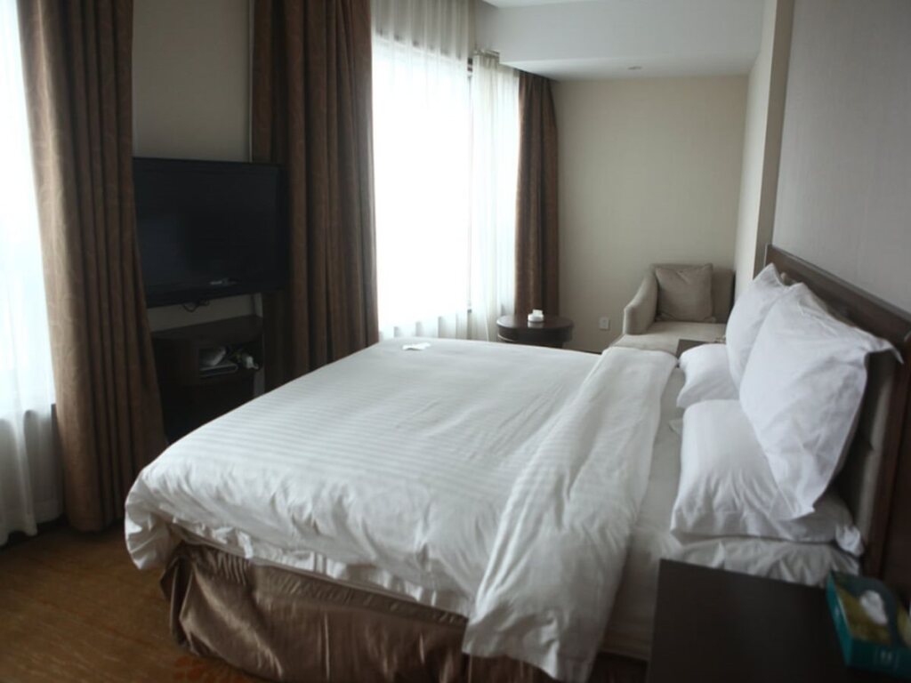 Maochen New Century Hotel — фото 4