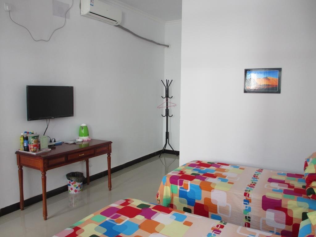Цзюцюань: Dunhuang Taoyuan Hostel