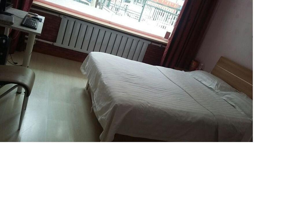 Фусинь: Baili Business Hotel