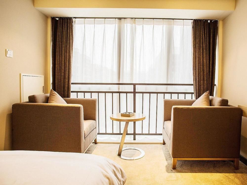 Chengdu Rongcheng Holiday Hotel — фото 2