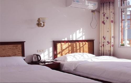 Эньши: Luofu Hotel