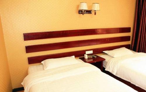 Эньши: Enshi Qingju Business Inn