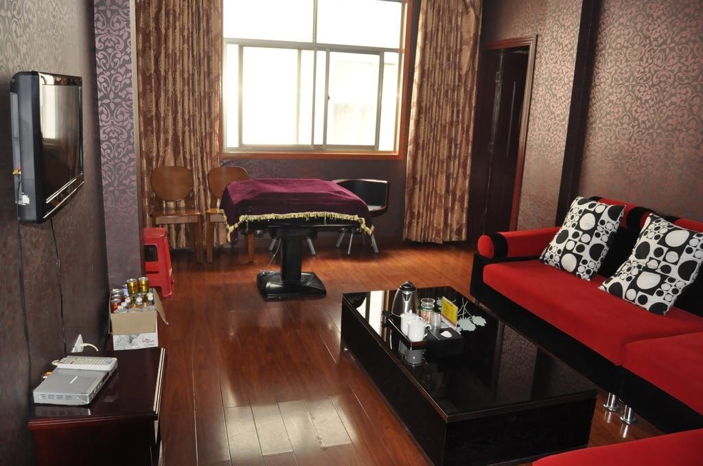 Эньши: Enshi Junren Business Hotel