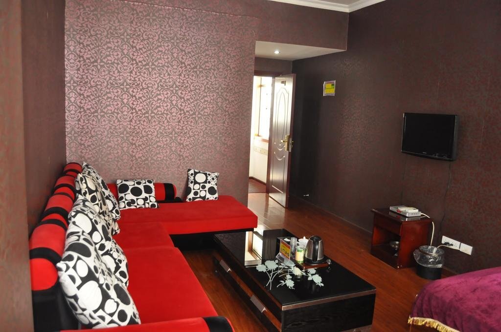 Эньши: Enshi Junren Business Hotel