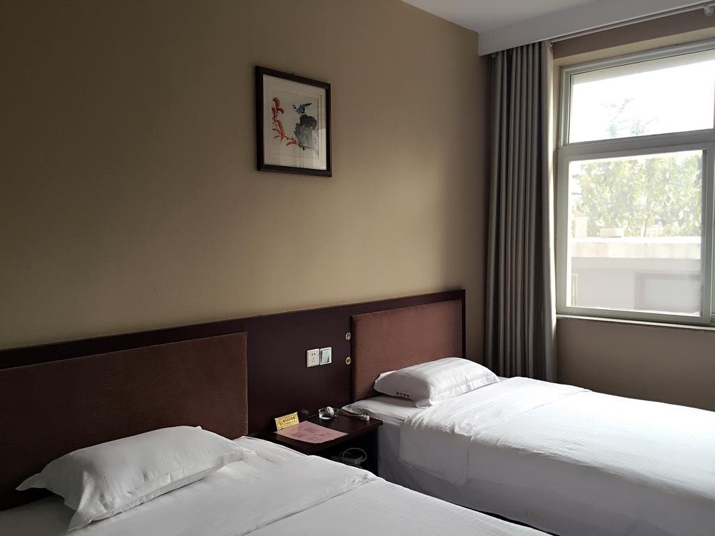 Цзаочжуан: Mingju Business Hotel