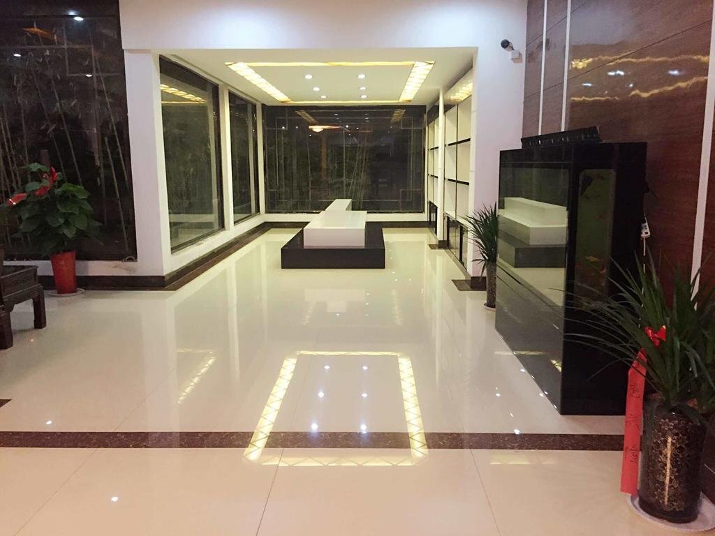 Цзаочжуан: Mingju Business Hotel