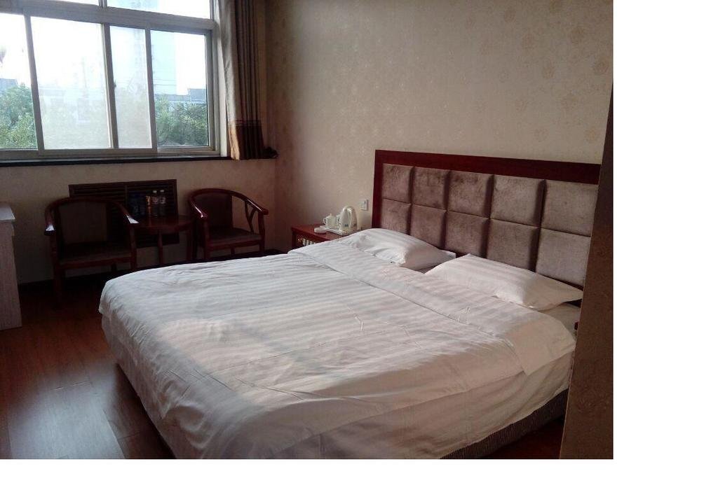 Таншань: Kuoze Express Inn