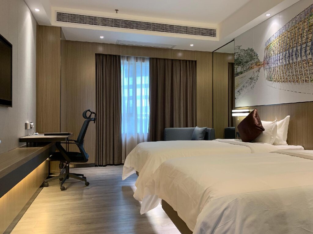 Чжуншань: Zhongshan Tegao Business Hotel