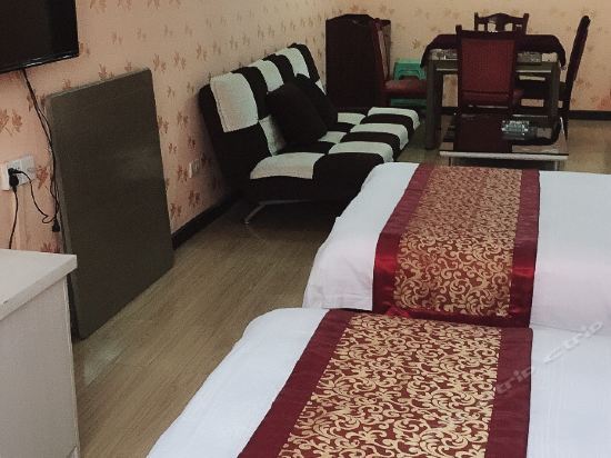Эньши: Huxing Business Hotel