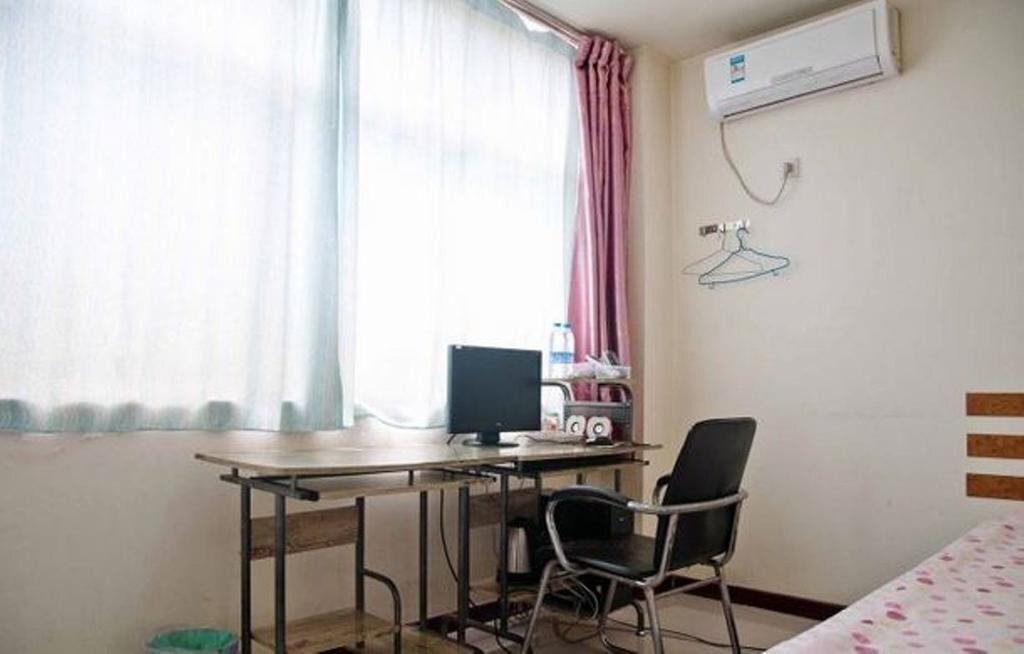 Таншань: Huatian Express Inn