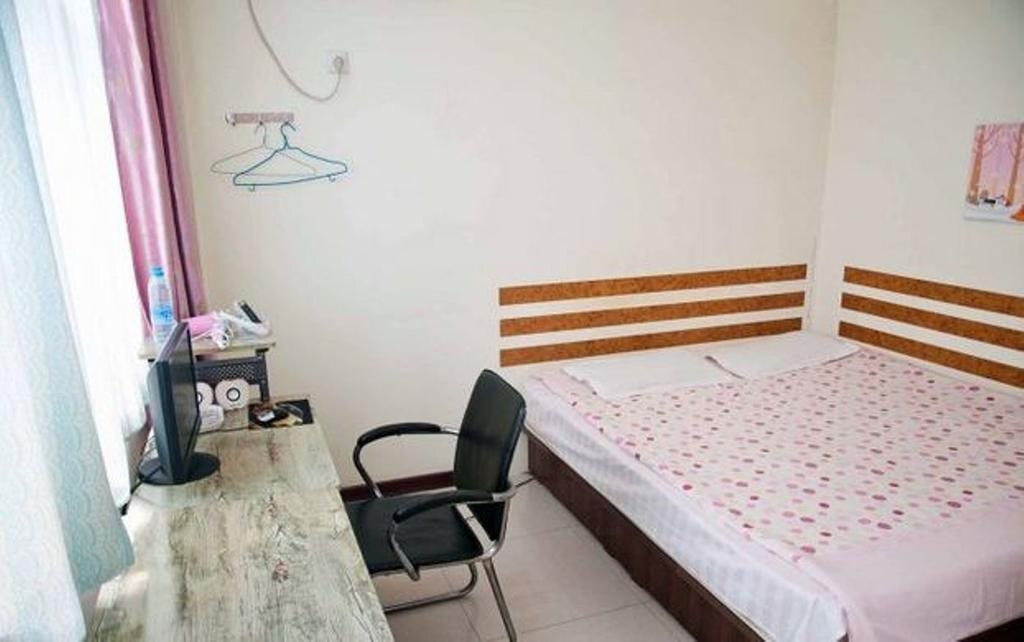 Таншань: Huatian Express Inn