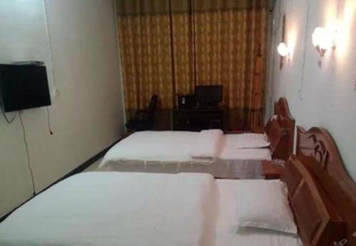 Эньши: Huiweilou Guest House