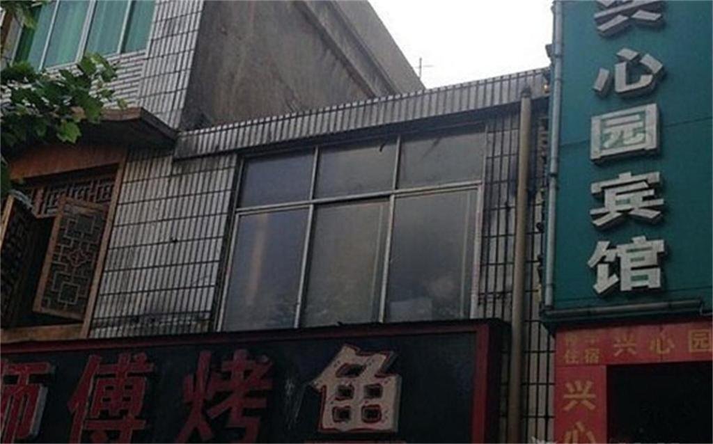 Эньши: Xingxinyuan Business Hotel