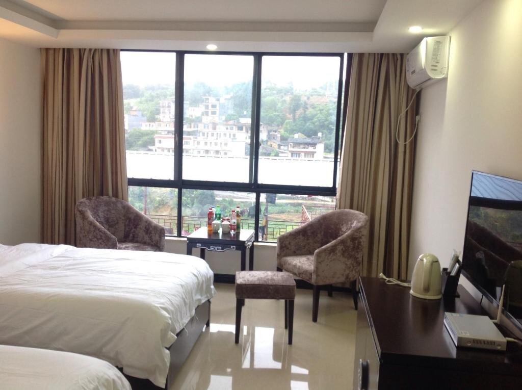 Яншо: Guilin Yangshuo Jingying Huanle Village Holiday Inn