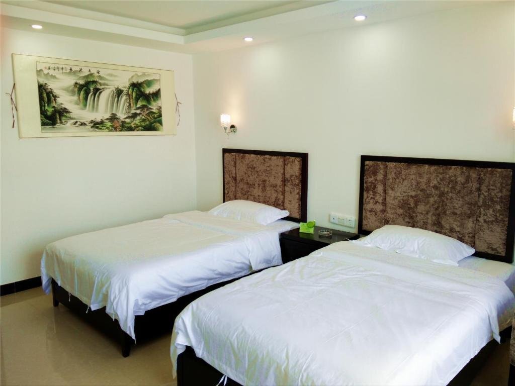 Яншо: Guilin Yangshuo Jingying Huanle Village Holiday Inn