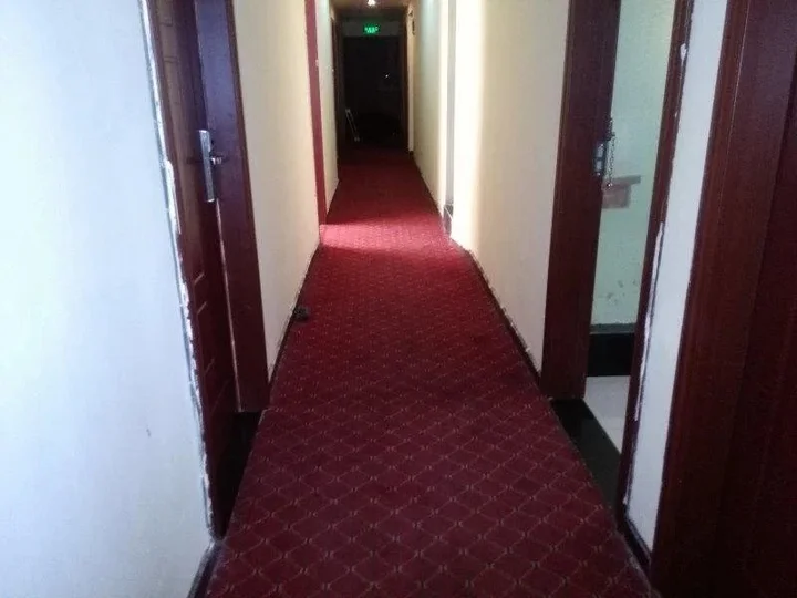 Эньши: Tongxing Business Hotel