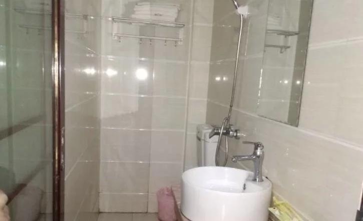 Эньши: Tongxing Business Hotel