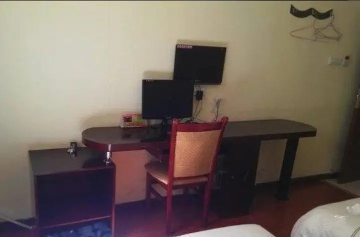 Эньши: Tongxing Business Hotel
