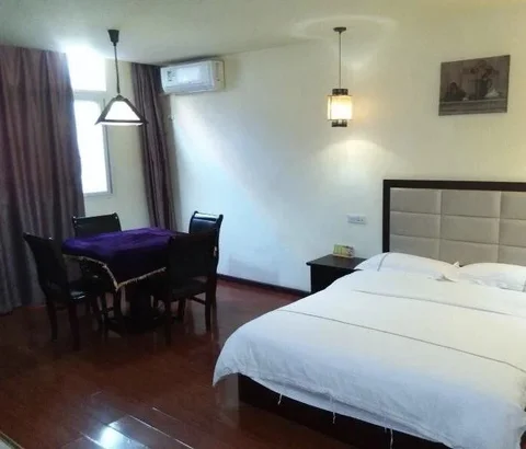 Эньши: Tongxing Business Hotel