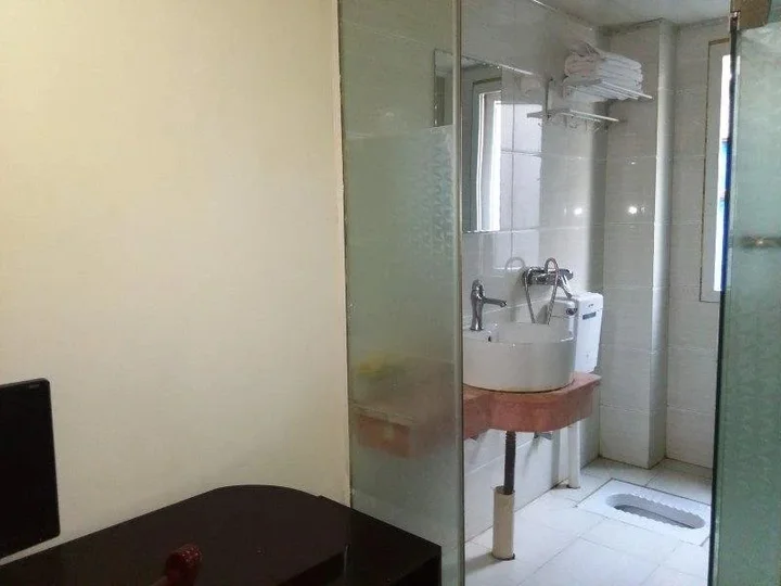 Эньши: Tongxing Business Hotel