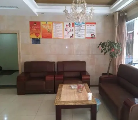 Эньши: Tongxing Business Hotel