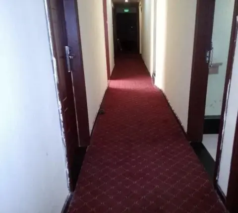 Эньши: Tongxing Business Hotel