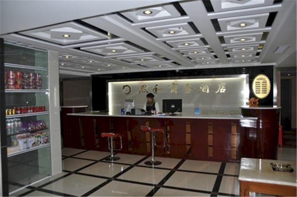 Эньши: Enshi Xihe Business Hotel