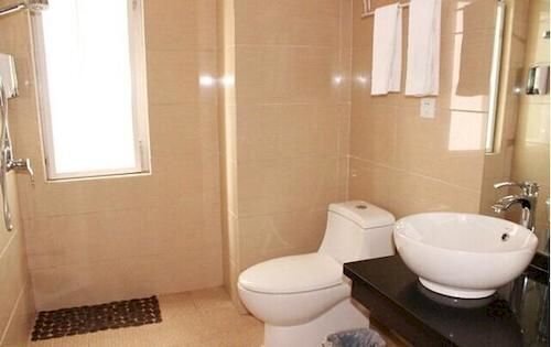 Эньши: Enshi Xihe Business Hotel
