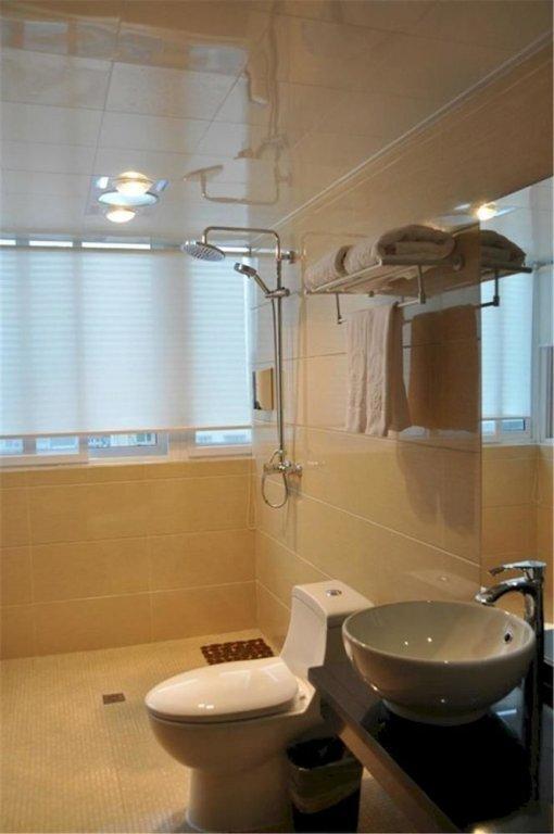 Эньши: Enshi Xihe Business Hotel