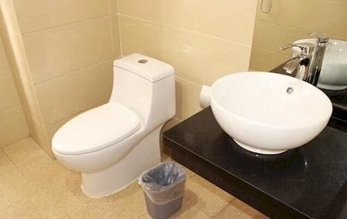 Эньши: Enshi Xihe Business Hotel