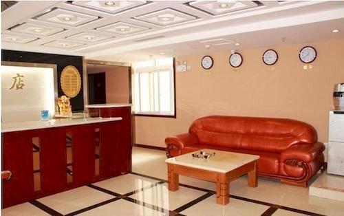 Эньши: Enshi Xihe Business Hotel