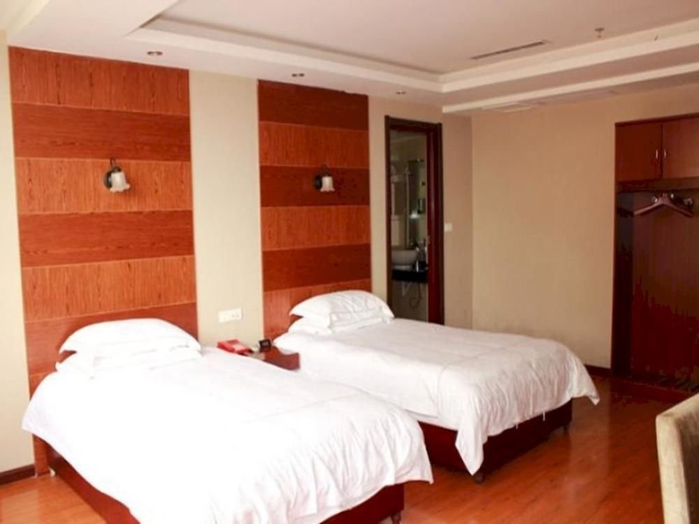 Эньши: Enshi Xihe Business Hotel