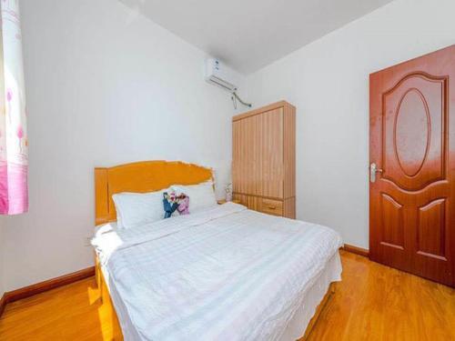Qingdao Golden Beach Ramble Beach Holiday Apartment — фото 1