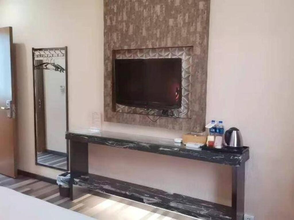 Шэньян: Wanxin Business Hotel