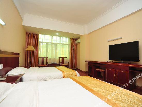 Цзинхун: Xishuangbanna Qunyi Business Hotel