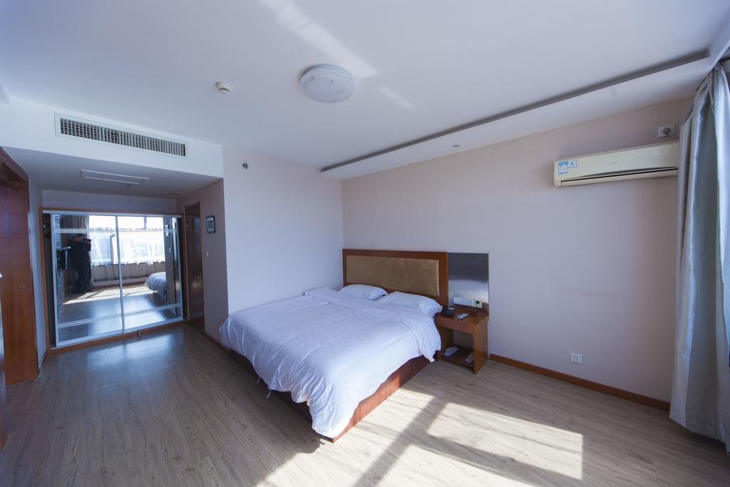 Даньдун: Huiyuan Holiday Hotel