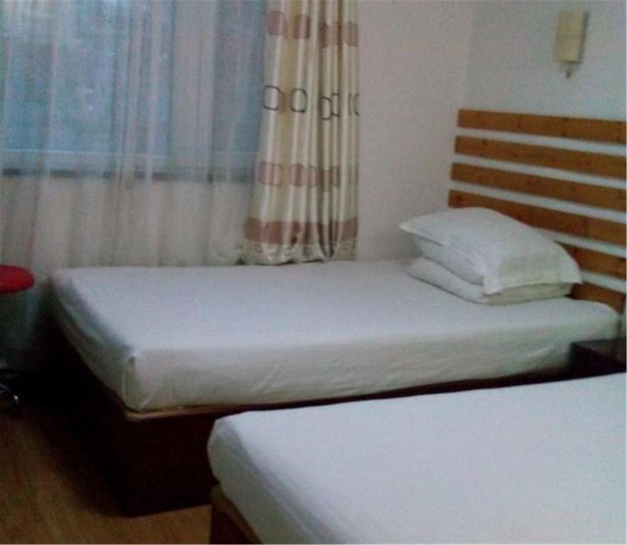Циндао: Qingdao Yike Business Hotel