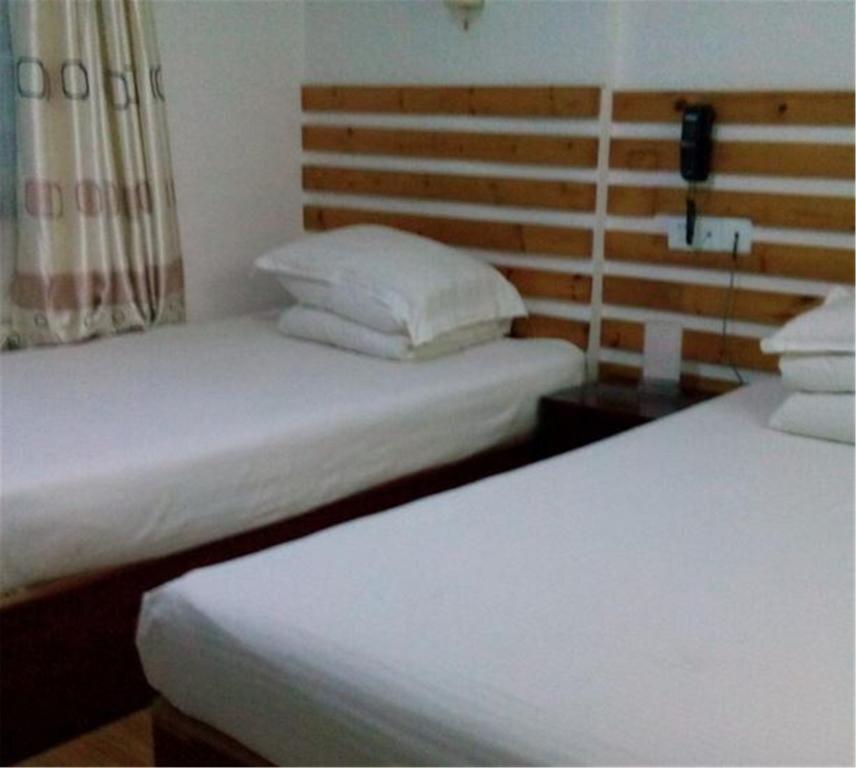 Циндао: Qingdao Yike Business Hotel