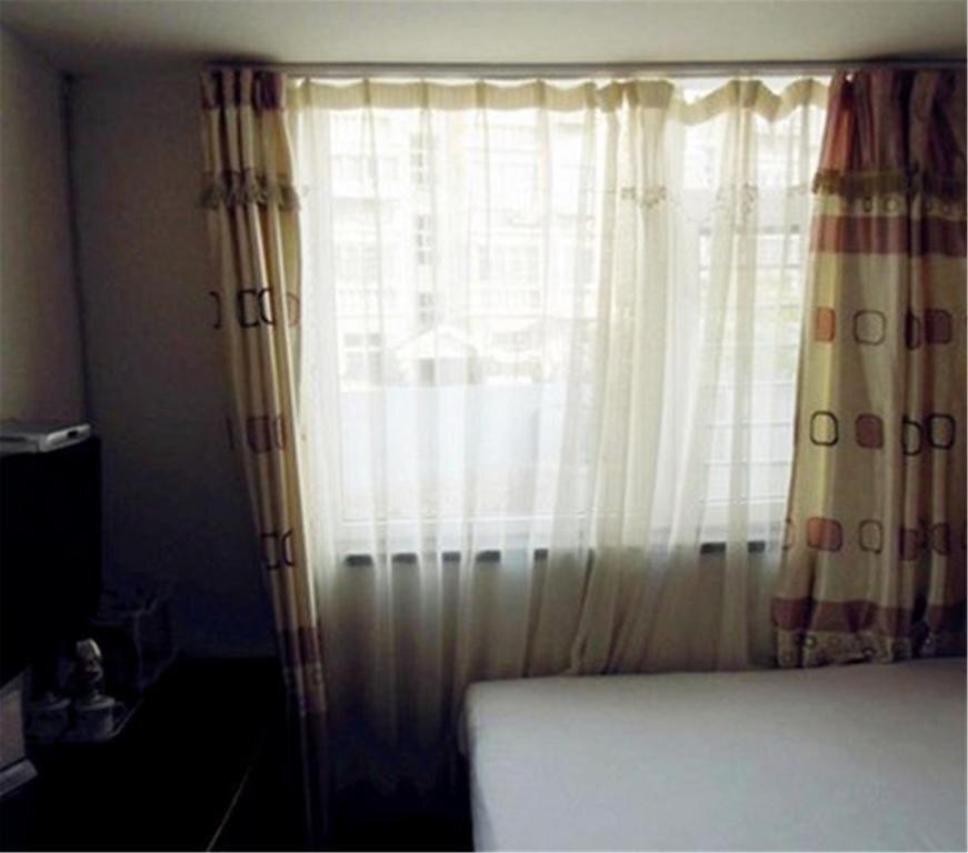 Циндао: Qingdao Yike Business Hotel