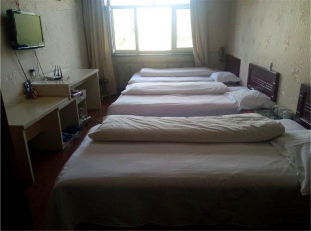 Хулун-Буир: Zhalantun Jianxin Business Hotel