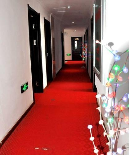 Синхай: Haicheng Jintai Business Hotel