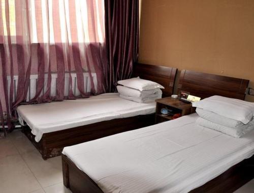 Синхай: Haicheng Jintai Business Hotel