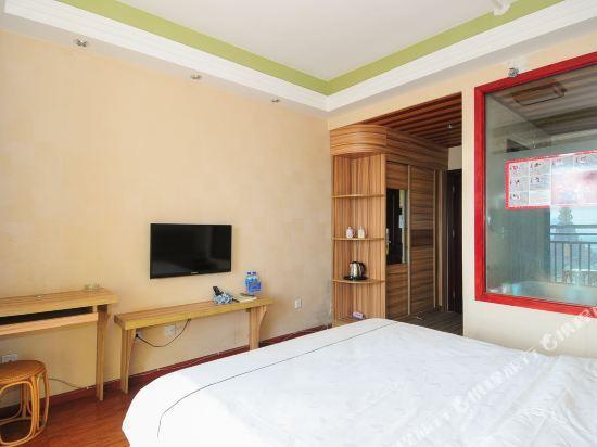 Цзинхун: Xishuangbanna Shibao Business Hotel