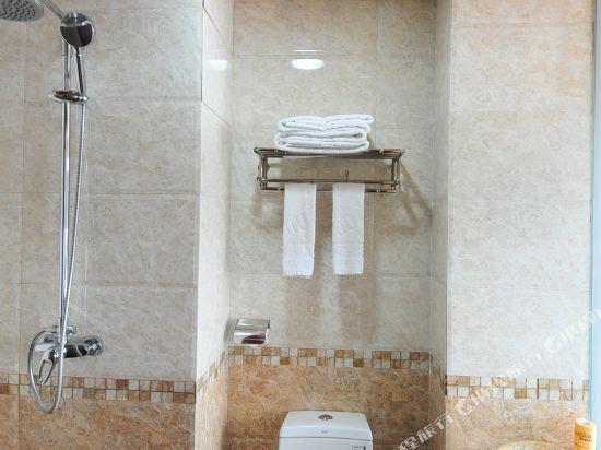 Цзинхун: Xishuangbanna Shibao Business Hotel