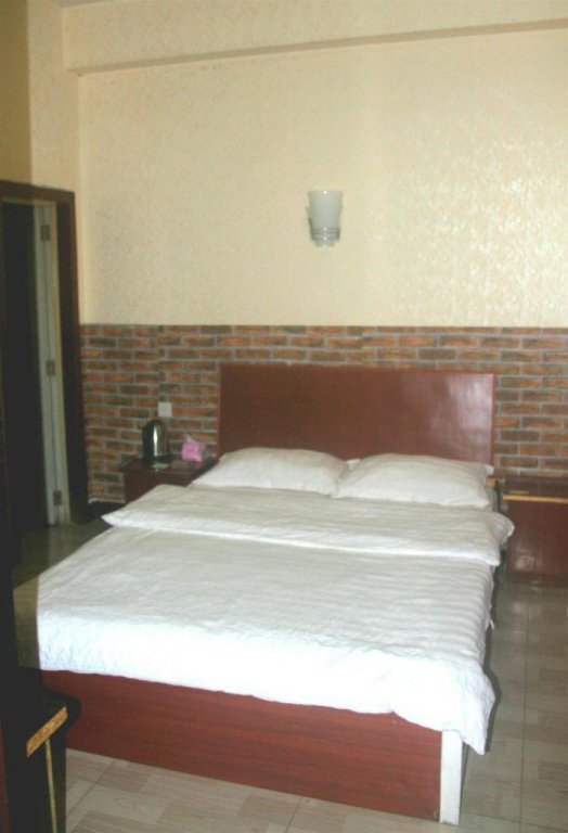 Яань: Hongming Business Hotel