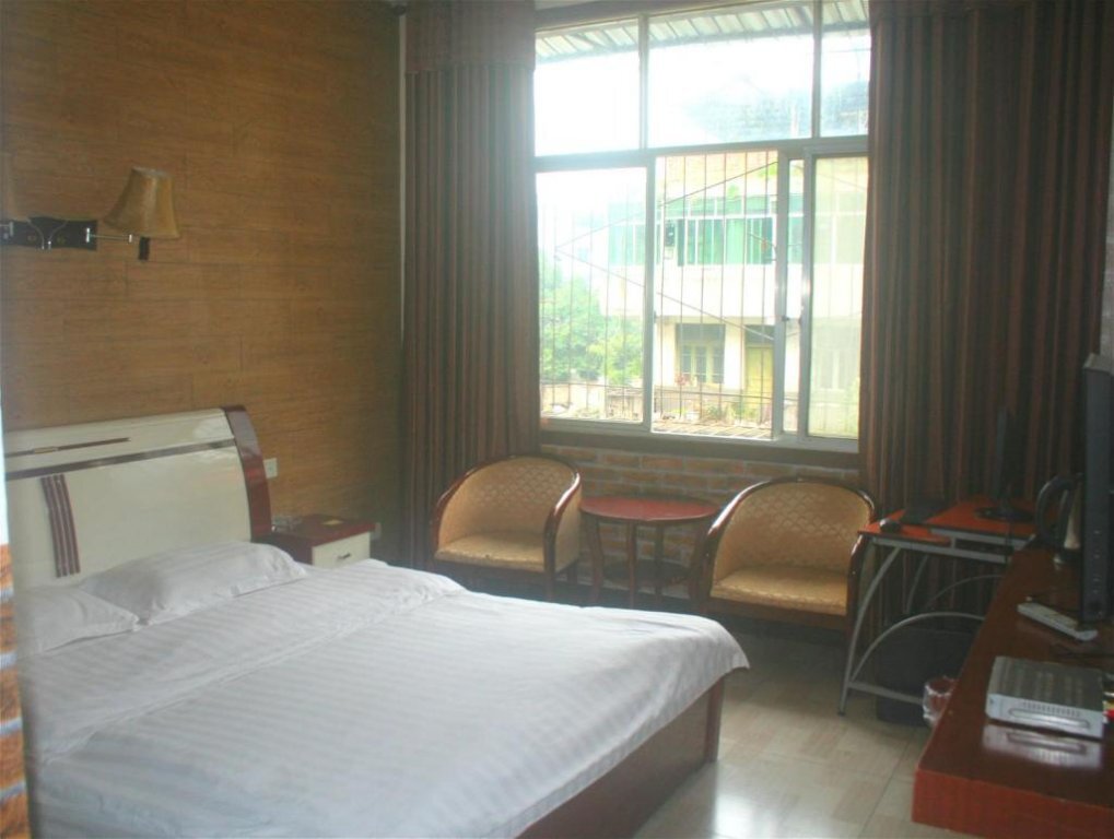 Яань: Hongming Business Hotel