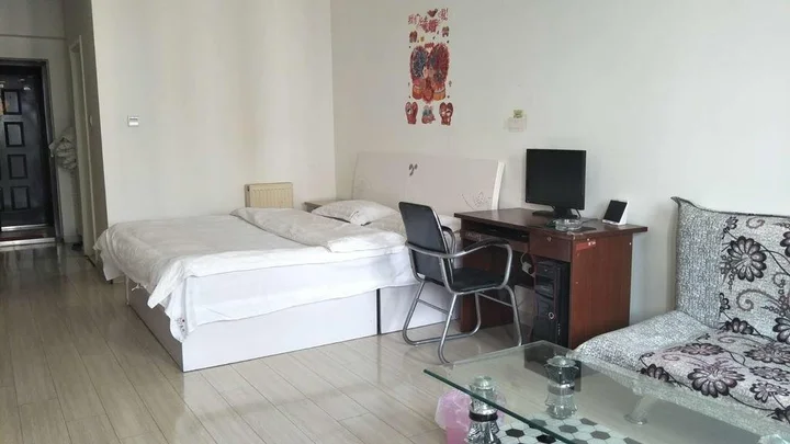 Паниин: Panjin Xinyuan ApartHotel