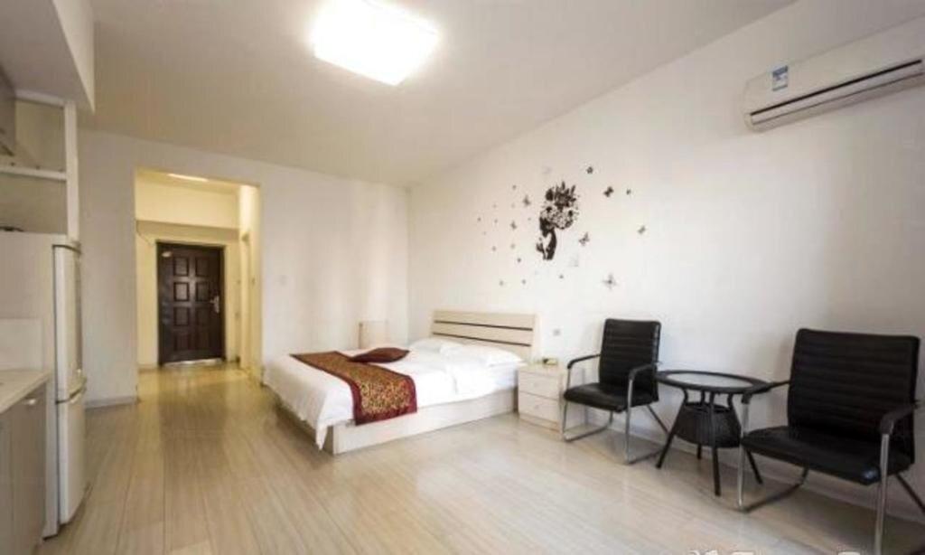 Паниин: Panjin Xinyuan ApartHotel