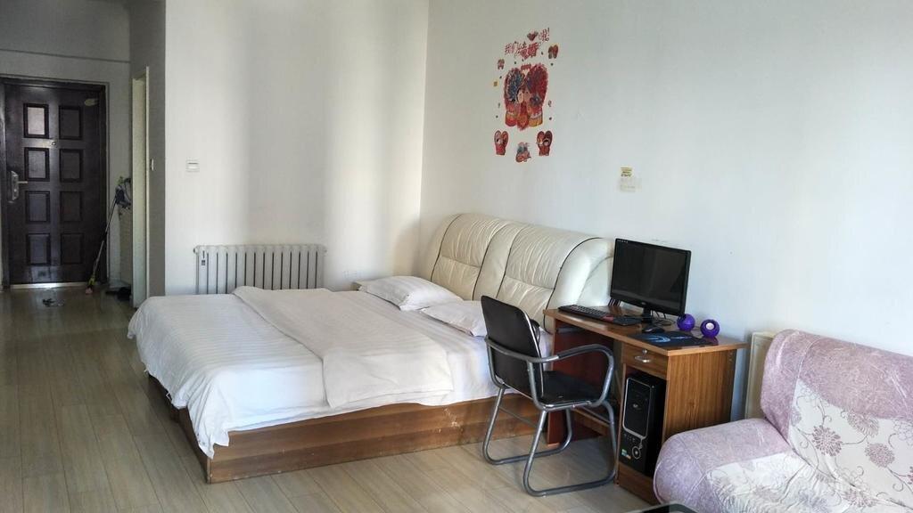 Паниин: Panjin Xinyuan ApartHotel